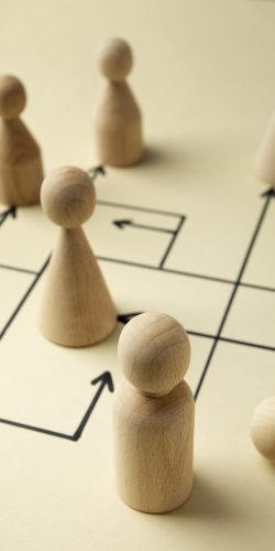high-angle-wooden-pawns-arrangement